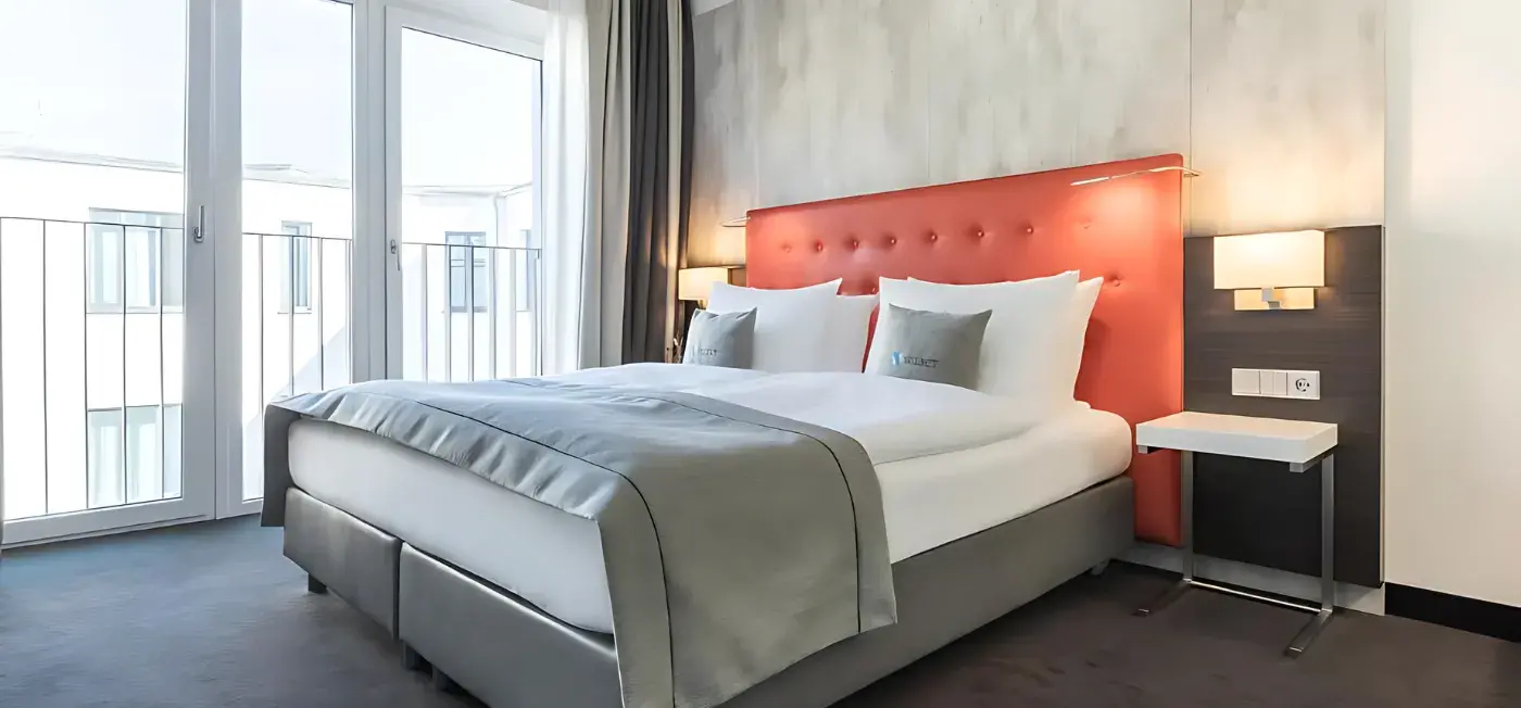 Bedroom view of Select Hotel The Wall Berlin, Prague, Budapest